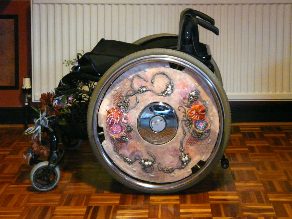 Wheelchair with spoke guards