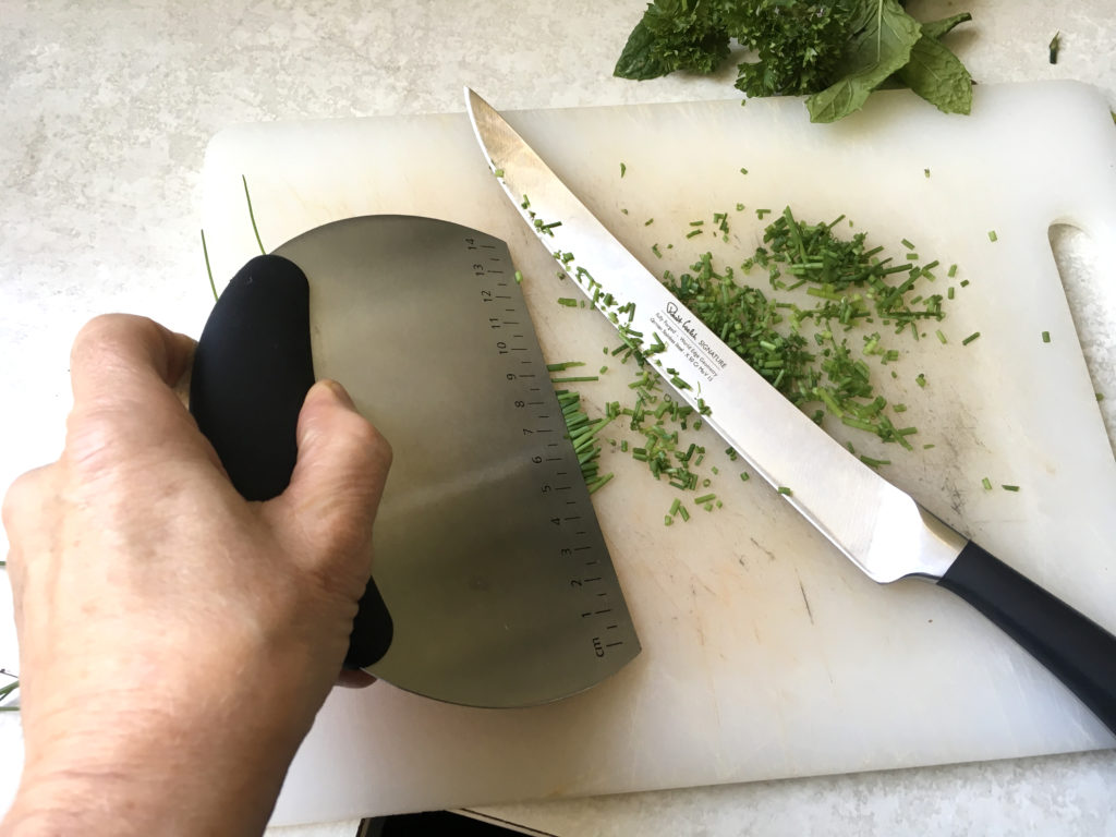 Using dough cutter as a chopping aid