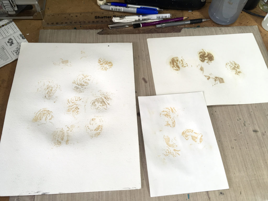 Marks left after dried teabags removed from watercolour paper