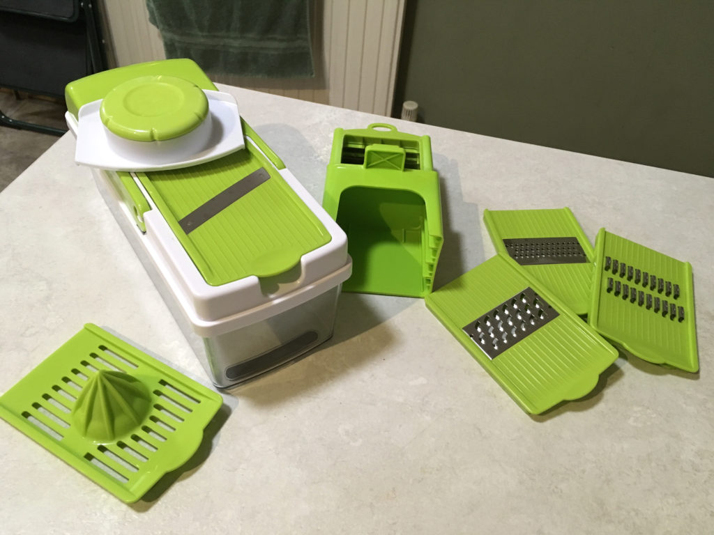 Multi-function food chopper. Mandolin and accessories.
