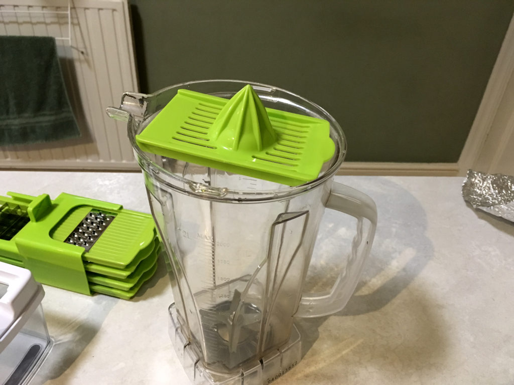 Multi-function food chopper. Citrus squeezer.