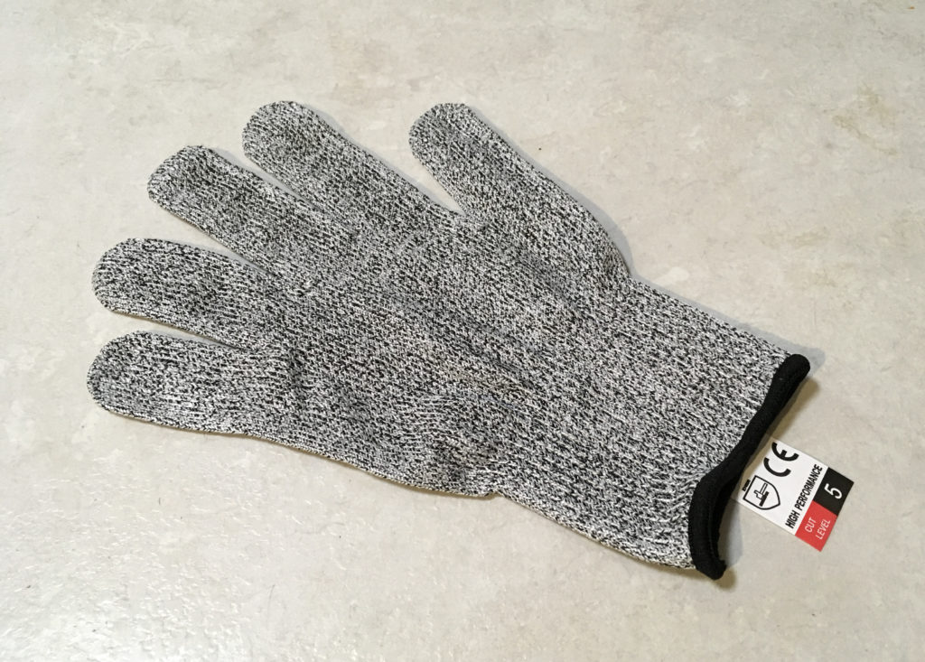 Protective glove for multi-function food chopper.