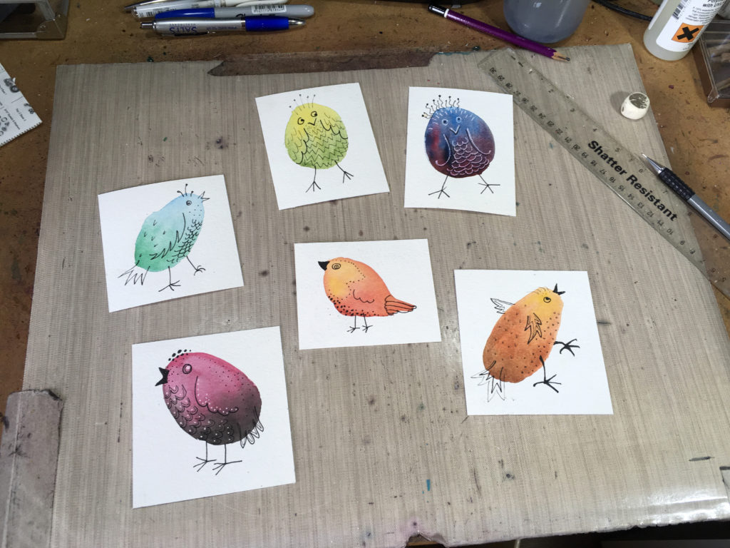 Watercolour doodled birds cut up