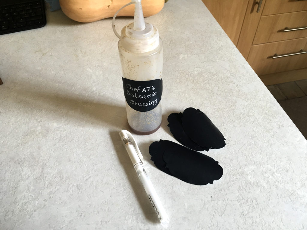Black die-cut labels with white gel pen