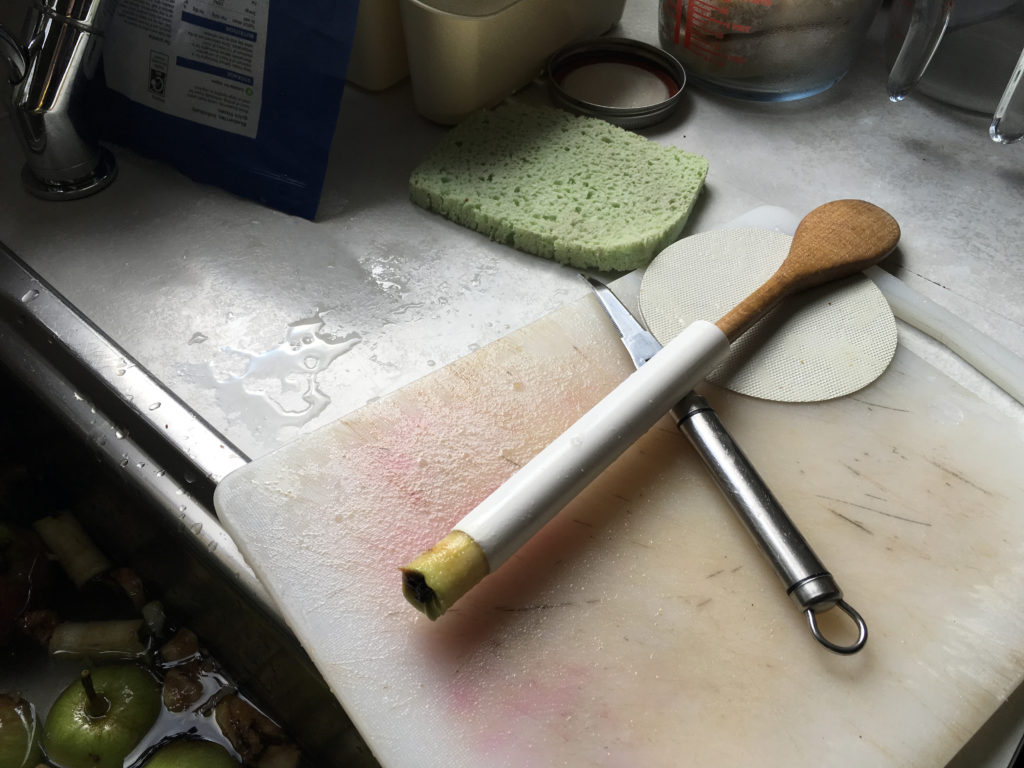 Wooden spoon handle for pushing core out of apple corer