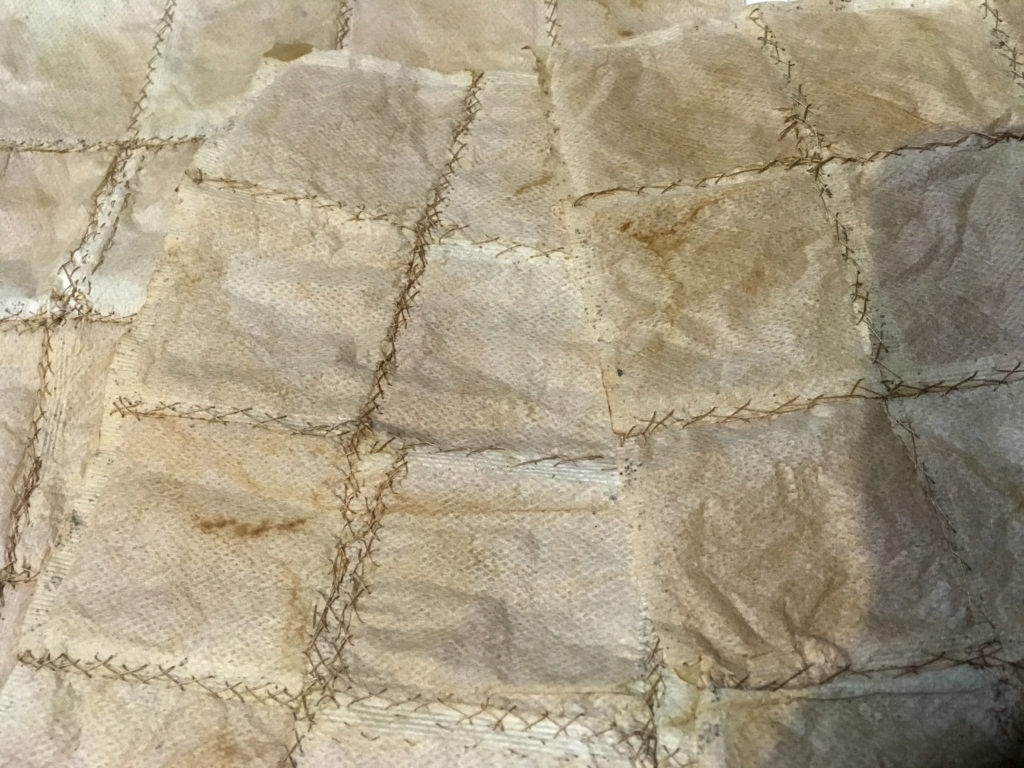 Detail of teabags sewn together